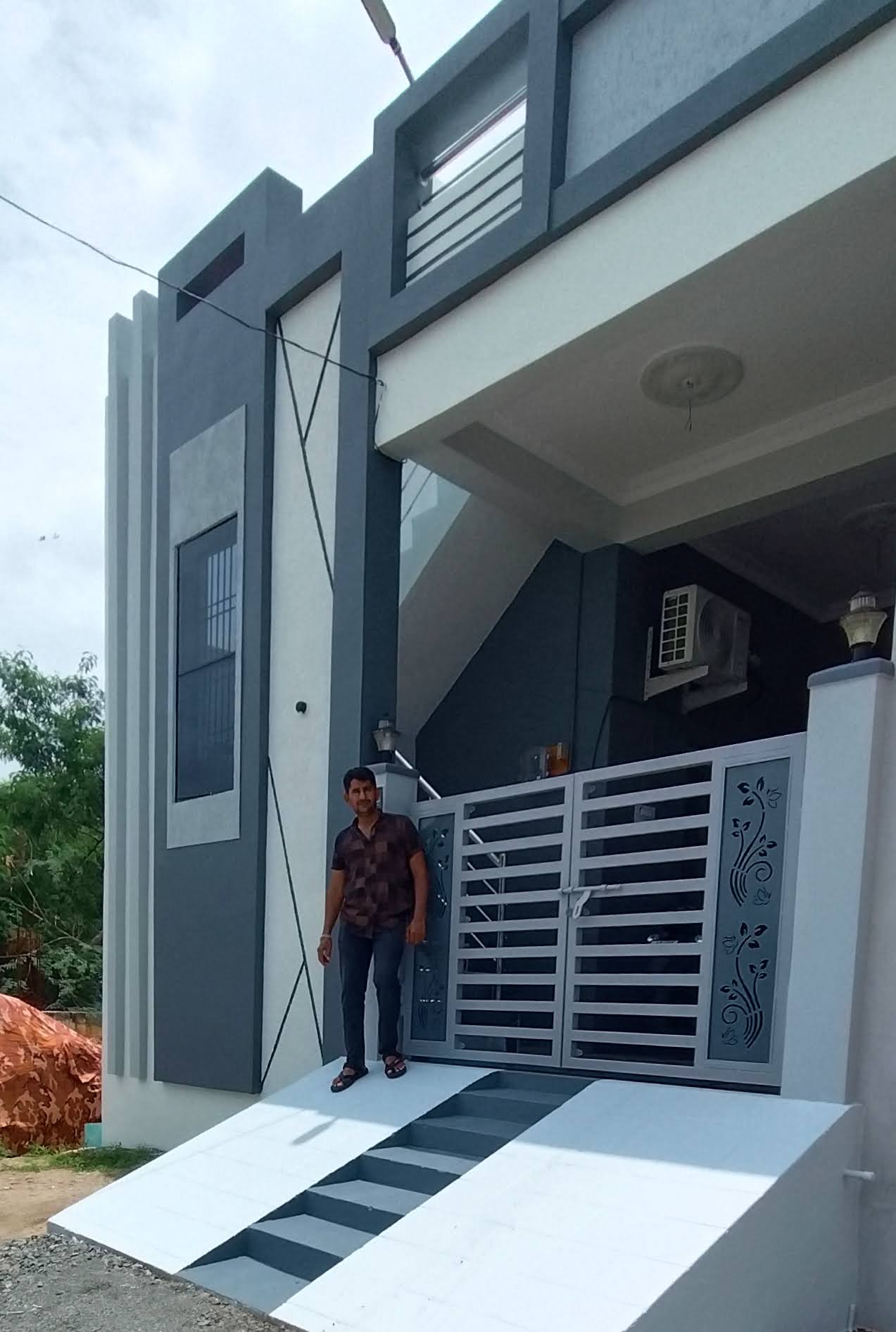 Modern Grey Front Elevation by KG Painters in Kurnool
