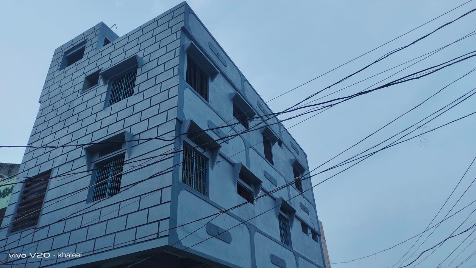 Textured Blue Exterior by KG Painters in Kurnool
