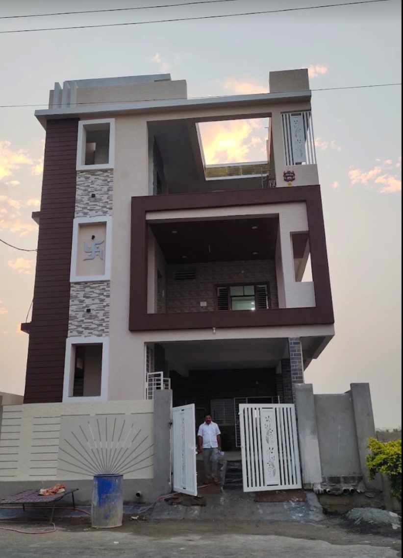 Contemporary maroon and white multi-level house exterior