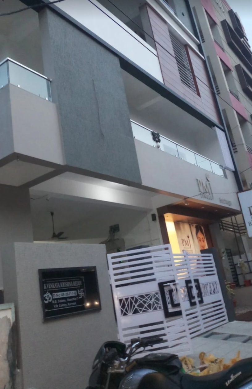 Modern multi-storey building exterior with textured wall finish