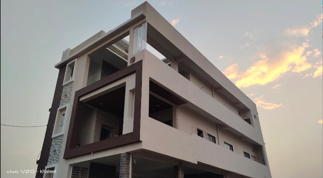 Modern house exterior photographed at sunset